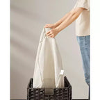 SONGMICS Panier de rangement avec couvercle, bac de rangement de 105 L (27,7 gallons), panier de rangement tressé pour couvertures avec poignées, pliable, doublure amovible, cadre en métal