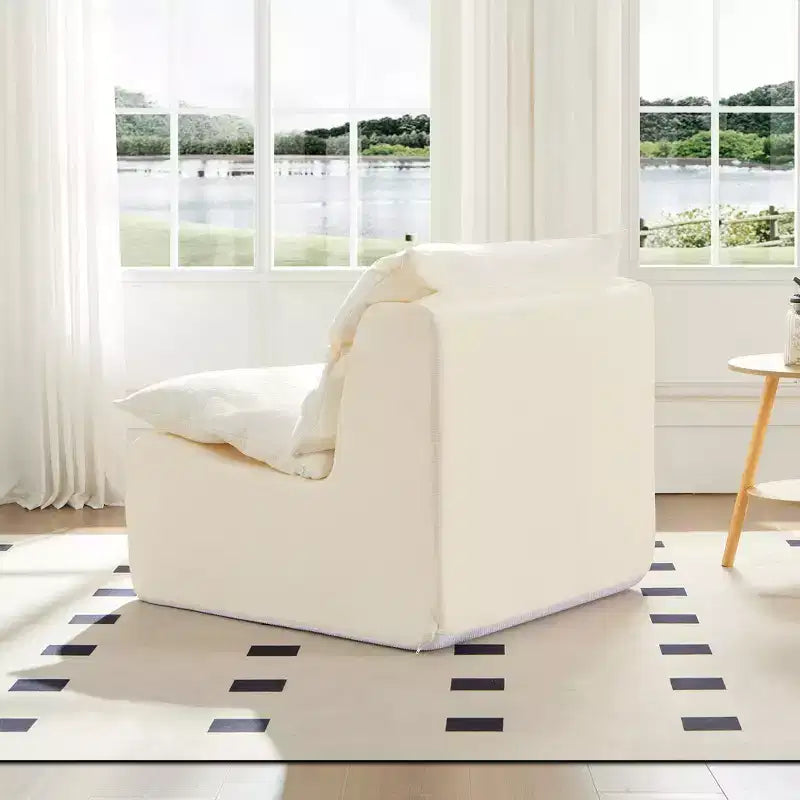 Fauteuil sans accoudoirs en mousse GDFStudio Vivien avec coussin