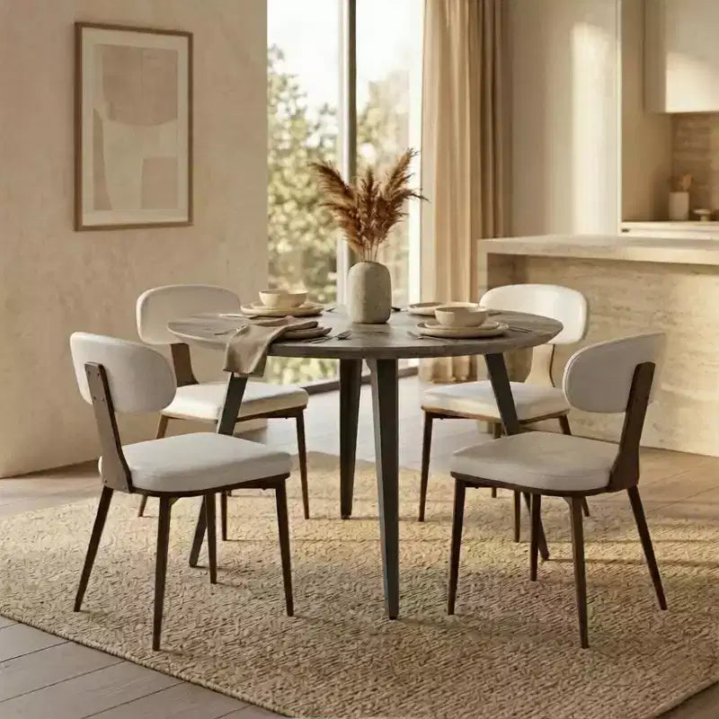 Table à manger ronde LeisureMod Ravenna de 47 pouces en bois, table de cuisine 4 personnes, pieds fuselés modernes en métal noir, parfaite pour les coins bistrot et les restaurants