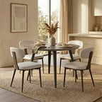 Table à manger ronde LeisureMod Ravenna de 47 pouces en bois, table de cuisine 4 personnes, pieds fuselés modernes en métal noir, parfaite pour les coins bistrot et les restaurants