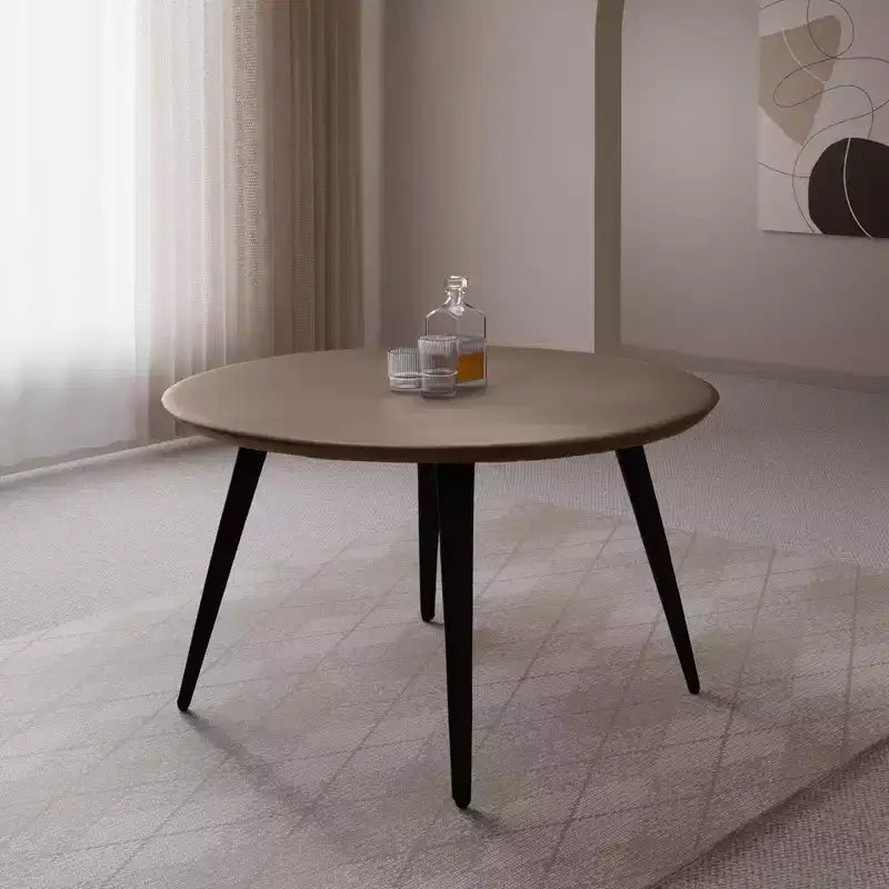 Table à manger ronde LeisureMod Ravenna de 47 pouces en bois, table de cuisine 4 personnes, pieds fuselés modernes en métal noir, parfaite pour les coins bistrot et les restaurants