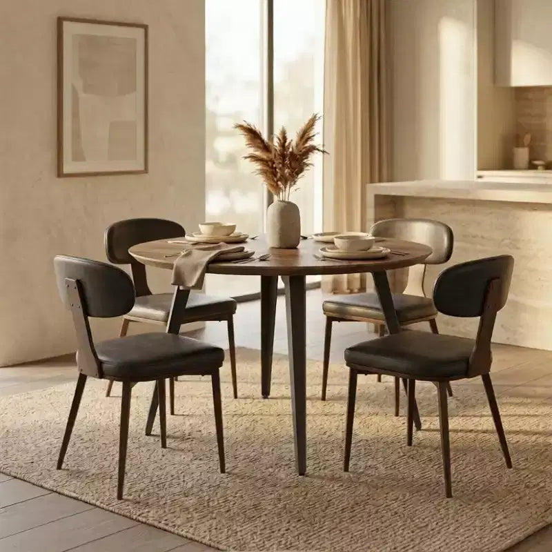 Table à manger ronde LeisureMod Ravenna de 47 pouces en bois, table de cuisine 4 personnes, pieds fuselés modernes en métal noir, parfaite pour les coins bistrot et les restaurants
