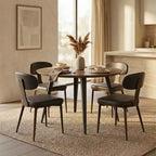 Table à manger ronde LeisureMod Ravenna de 47 pouces en bois, table de cuisine 4 personnes, pieds fuselés modernes en métal noir, parfaite pour les coins bistrot et les restaurants