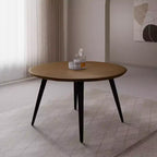 Table à manger ronde LeisureMod Ravenna de 47 pouces en bois, table de cuisine 4 personnes, pieds fuselés modernes en métal noir, parfaite pour les coins bistrot et les restaurants