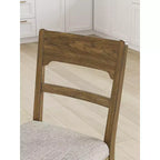 Tabourets de bar rembourrés Cabalynn d'Ashley Signature Design, hauteur comptoir, lot de 2, cadre marron clair avec siège rembourré couleur avoine