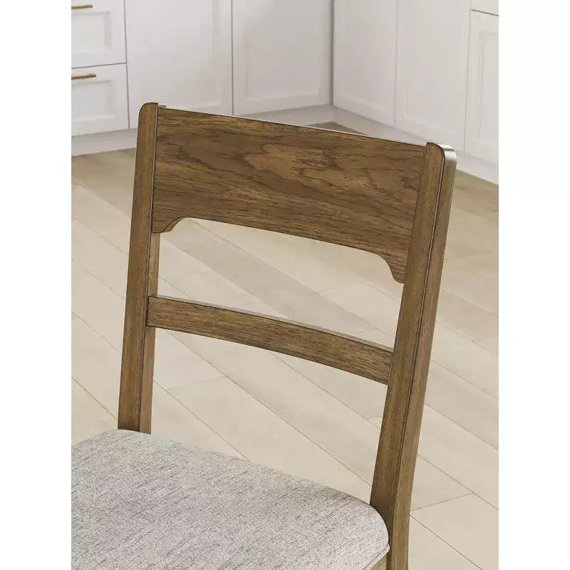 Tabourets de bar rembourrés Cabalynn d'Ashley Signature Design, hauteur comptoir, lot de 2, cadre marron clair avec siège rembourré couleur avoine