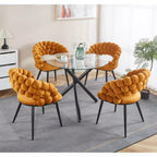 Table à manger ronde avec pied en métal noir et plateau en verre trempé, design moderne peu encombrant pour cuisine ou salon