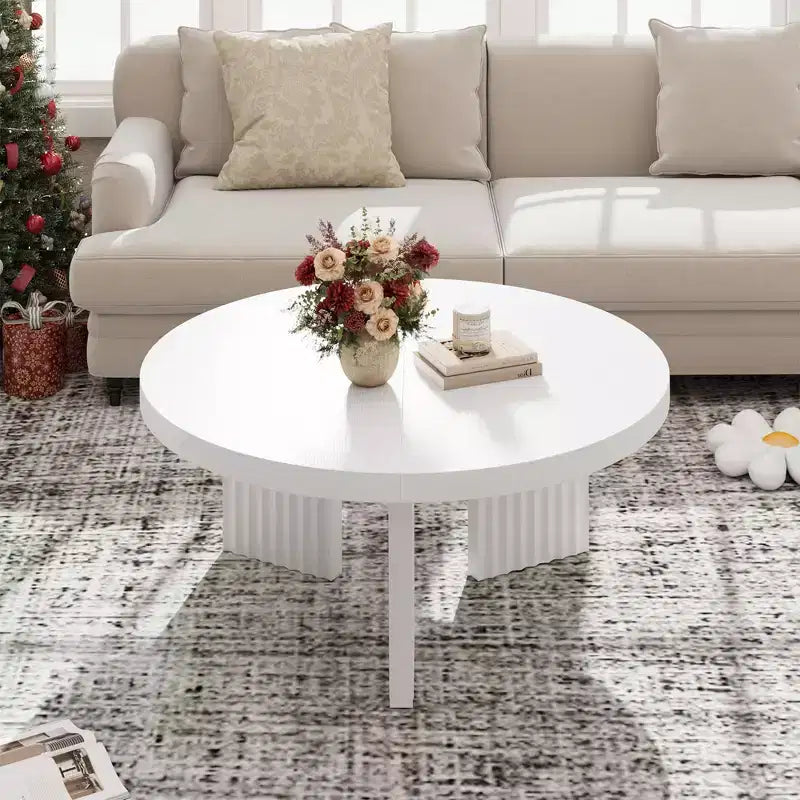 Table basse ronde moderne
Plateau de 3,3 cm d'épaisseur
Pieds cannelés élégants
Idéale pour le salon/chambre à coucher
Assemblage facile
Finition bois blanc