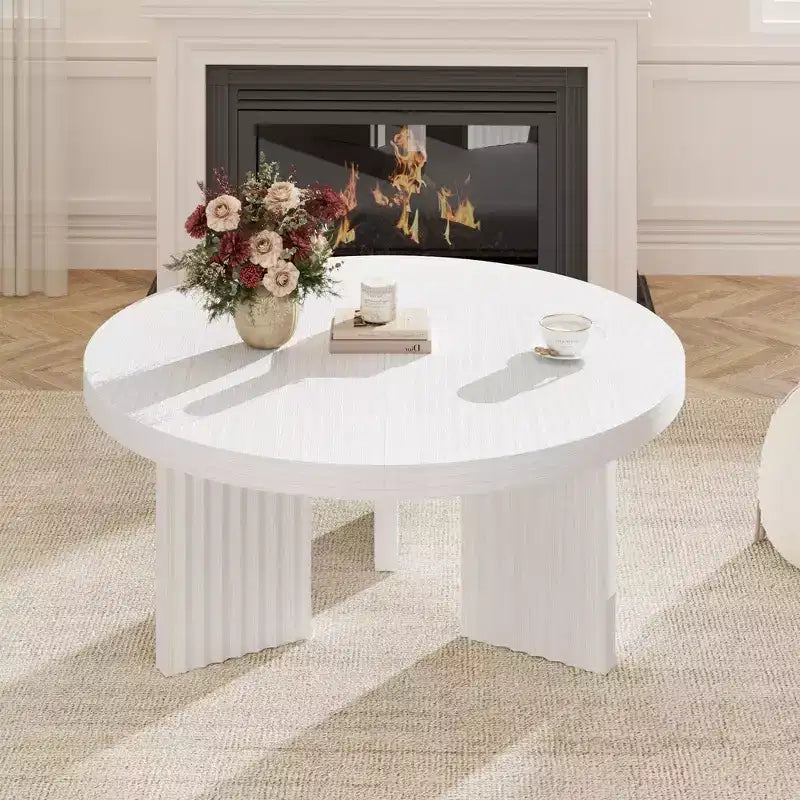 Table basse ronde moderne
Plateau de 3,3 cm d'épaisseur
Pieds cannelés élégants
Idéale pour le salon/chambre à coucher
Assemblage facile
Finition bois blanc