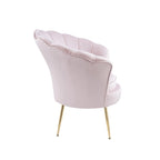 Fauteuil crapaud en velours avec dossier festonné et pieds en métal
