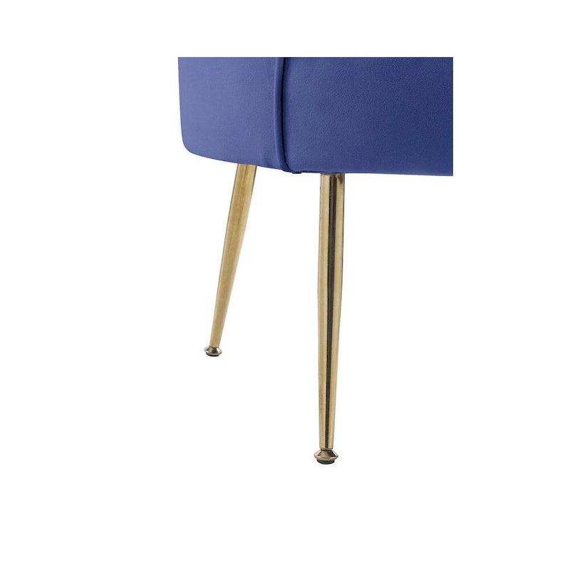 Fauteuil crapaud en velours avec dossier festonné et pieds en métal